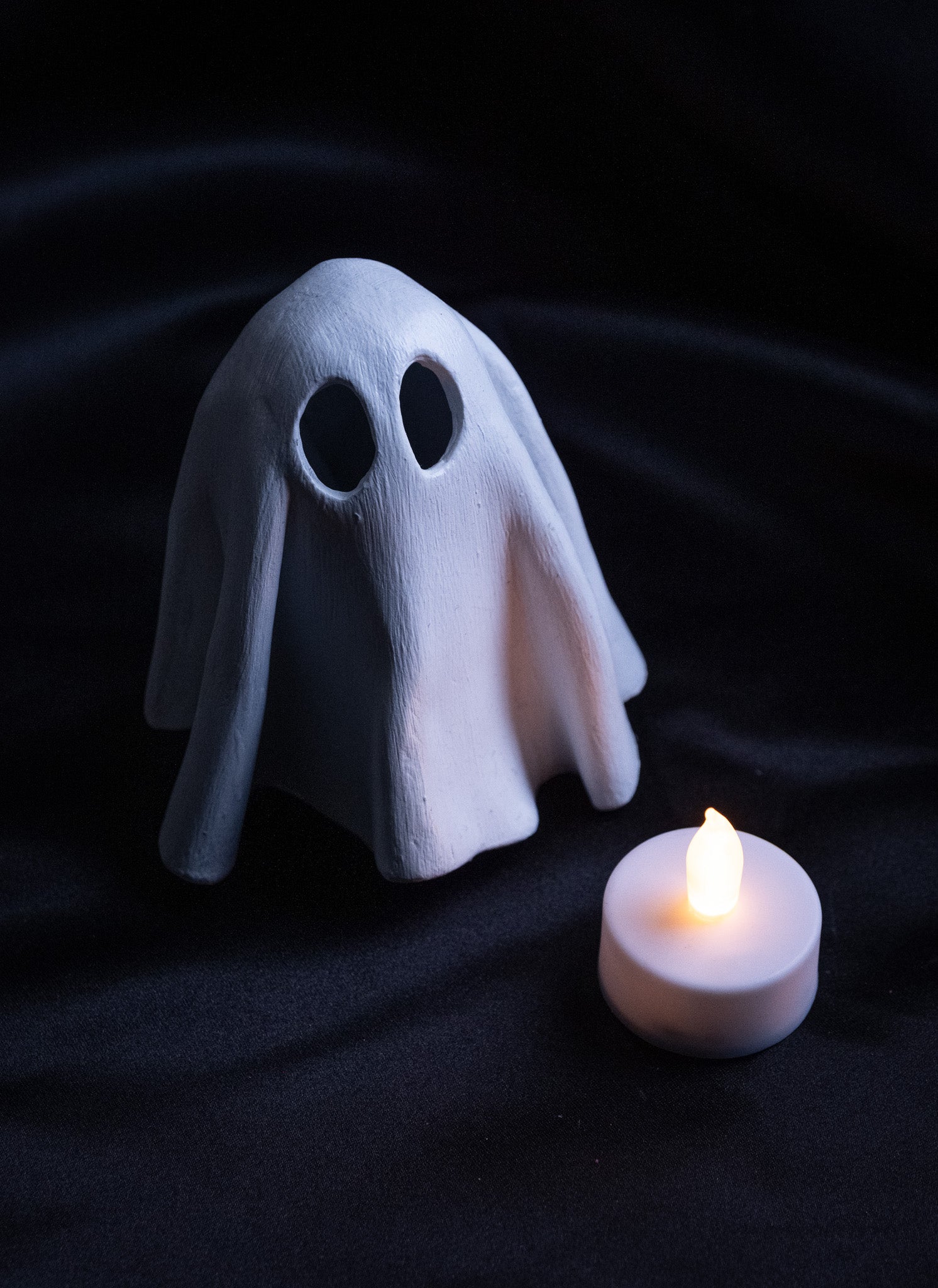Le fantôme et sa bougie